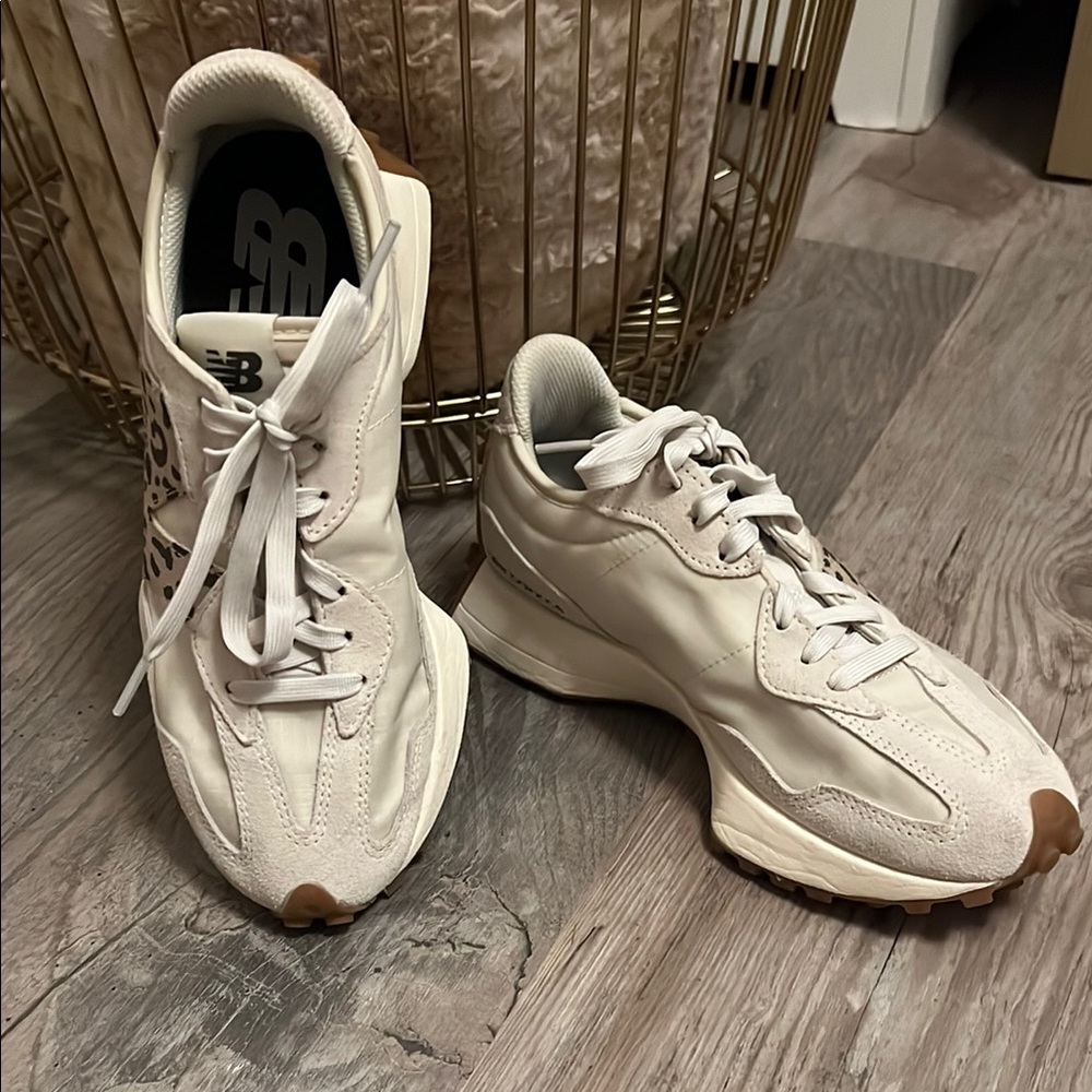 New Balance 327 sneakers in Off White with leopard detail